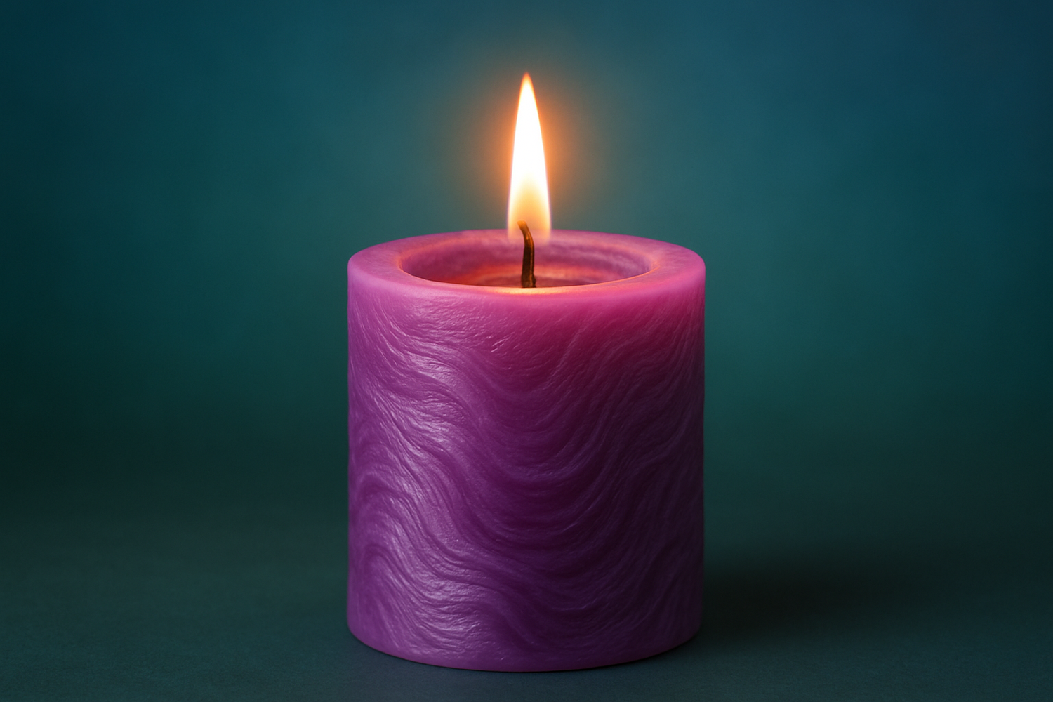 purple candle with green and blue background